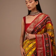 chrome_yellow_saree_in_silk_with_multi_colored_patola1.webp