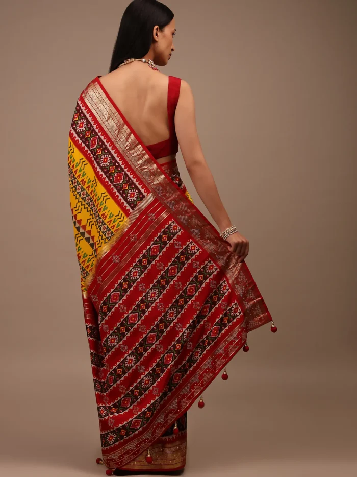 chrome_yellow_saree_in_silk_with_multi_colored_patola2.webp