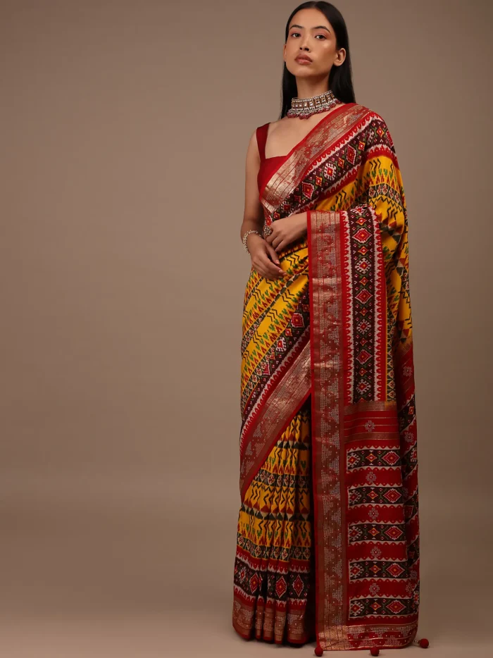 chrome_yellow_saree_in_silk_with_multi_colored_patola5.webp
