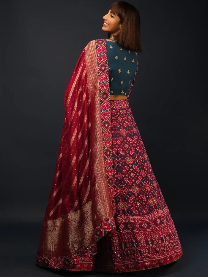 deep_blue_lehenga_in_silk_with_maroon_patola3.webp