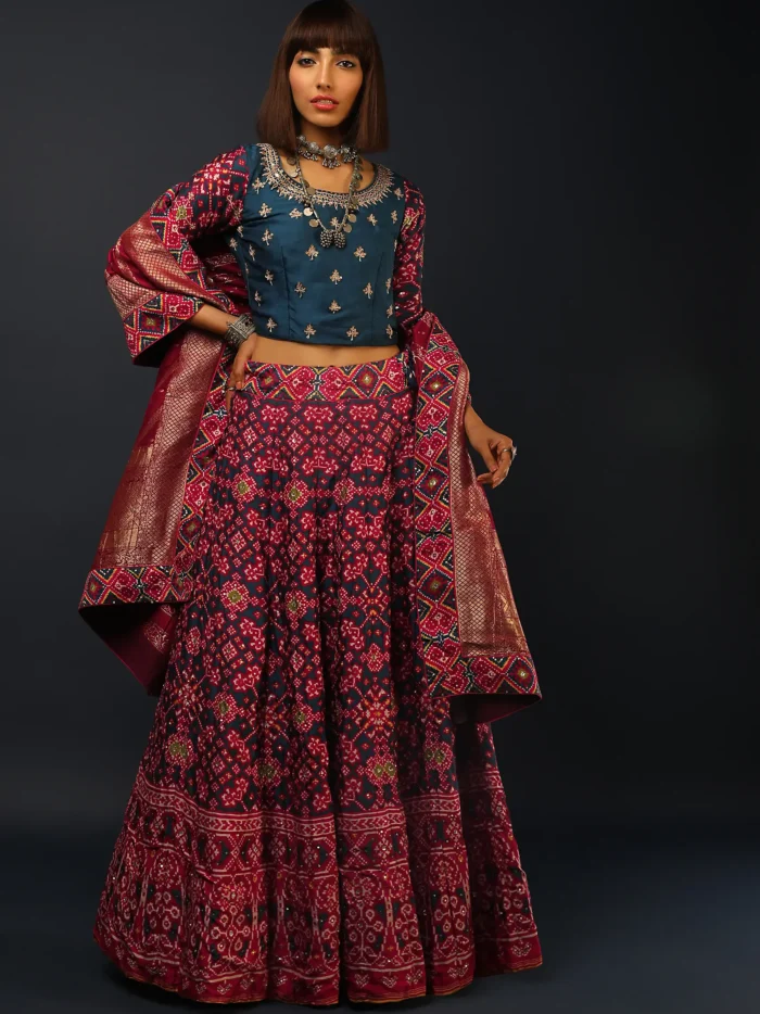 deep_blue_lehenga_in_silk_with_maroon_patola_print.webp