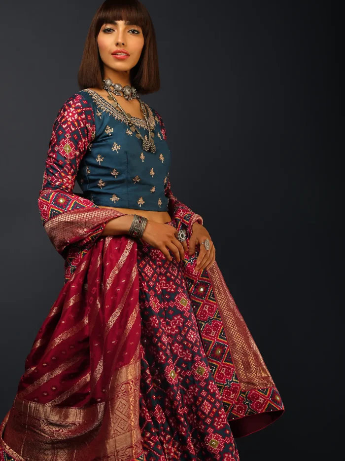 deep_blue_lehenga_in_silk_with_maroon_patola_print1.webp