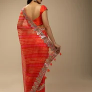 orange_and_fuchsia_dual_toned_saree_in_organza_with_lehariya2.webp