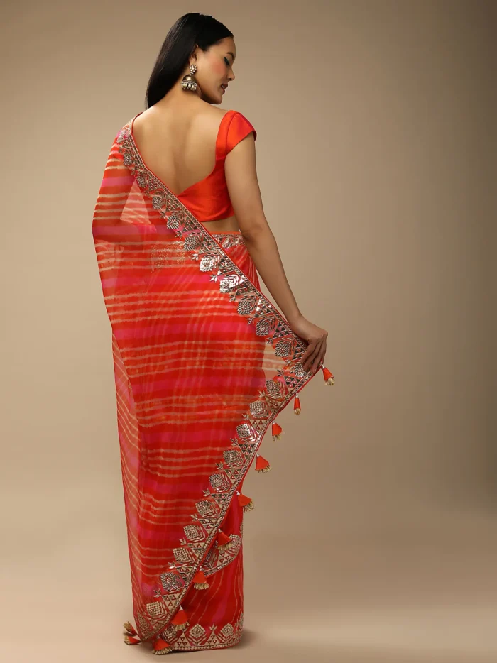 orange_and_fuchsia_dual_toned_saree_in_organza_with_lehariya2.webp