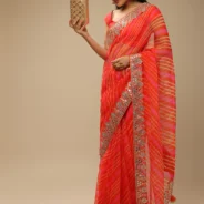 orange_and_fuchsia_dual_toned_saree_in_organza_with_lehariya3.webp
