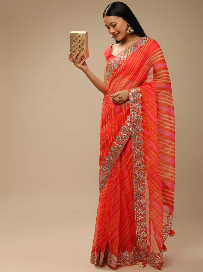 orange_and_fuchsia_dual_toned_saree_in_organza_with_lehariya3.webp